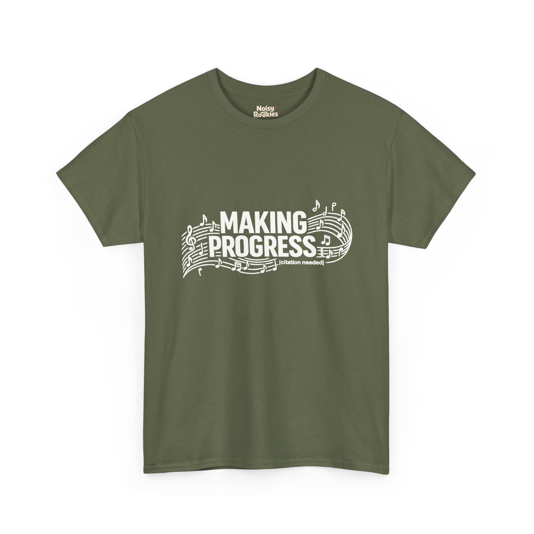 White t-shirt design reading MAKING PROGRESS with a small "citation needed" tag, woven through a flowing musical staff with a treble clef and scattered notes.