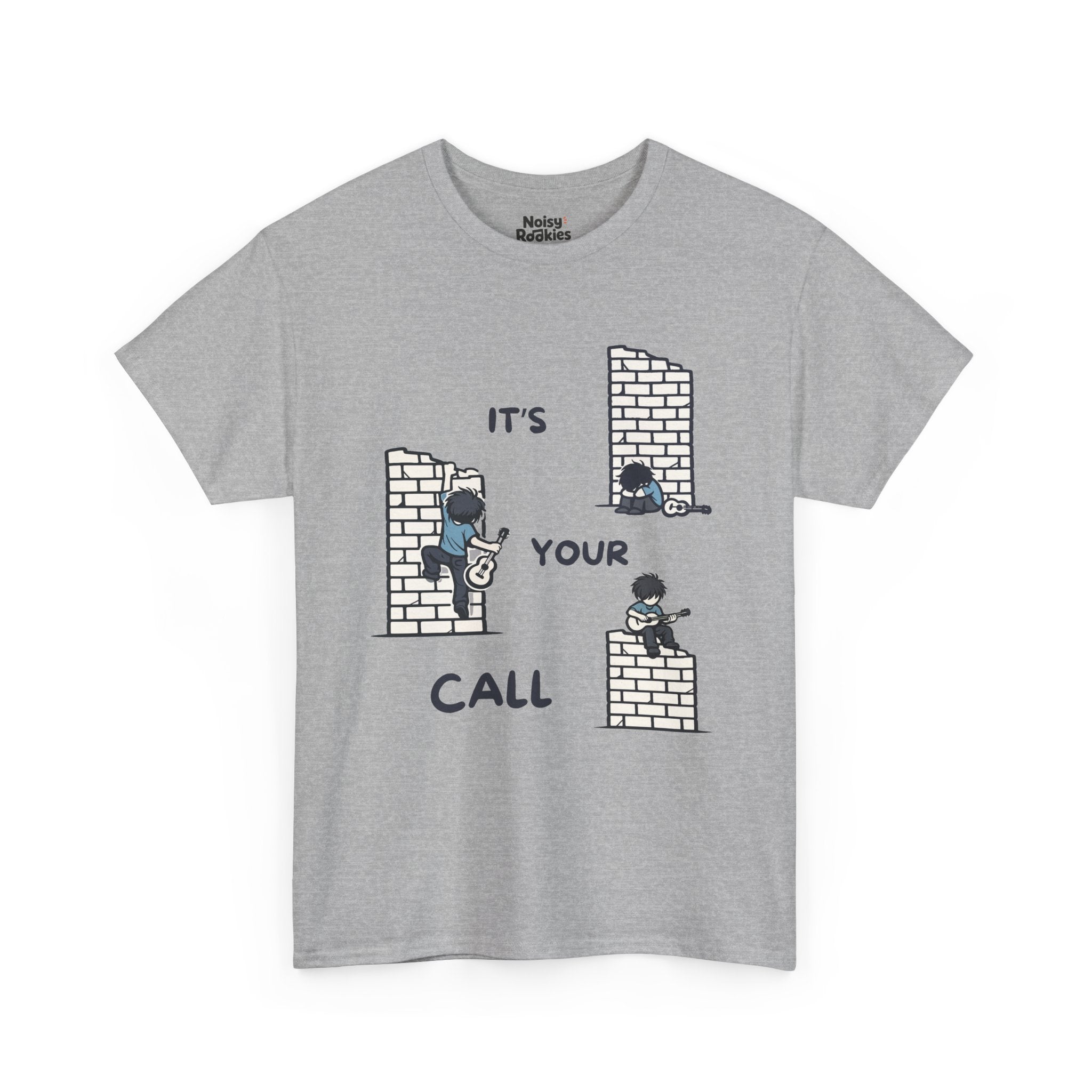 Cartoon scene on a light tee: three small guitarists at a brick wall (one slumped, one climbing, one playing on top) with the words "IT'S YOUR CALL"