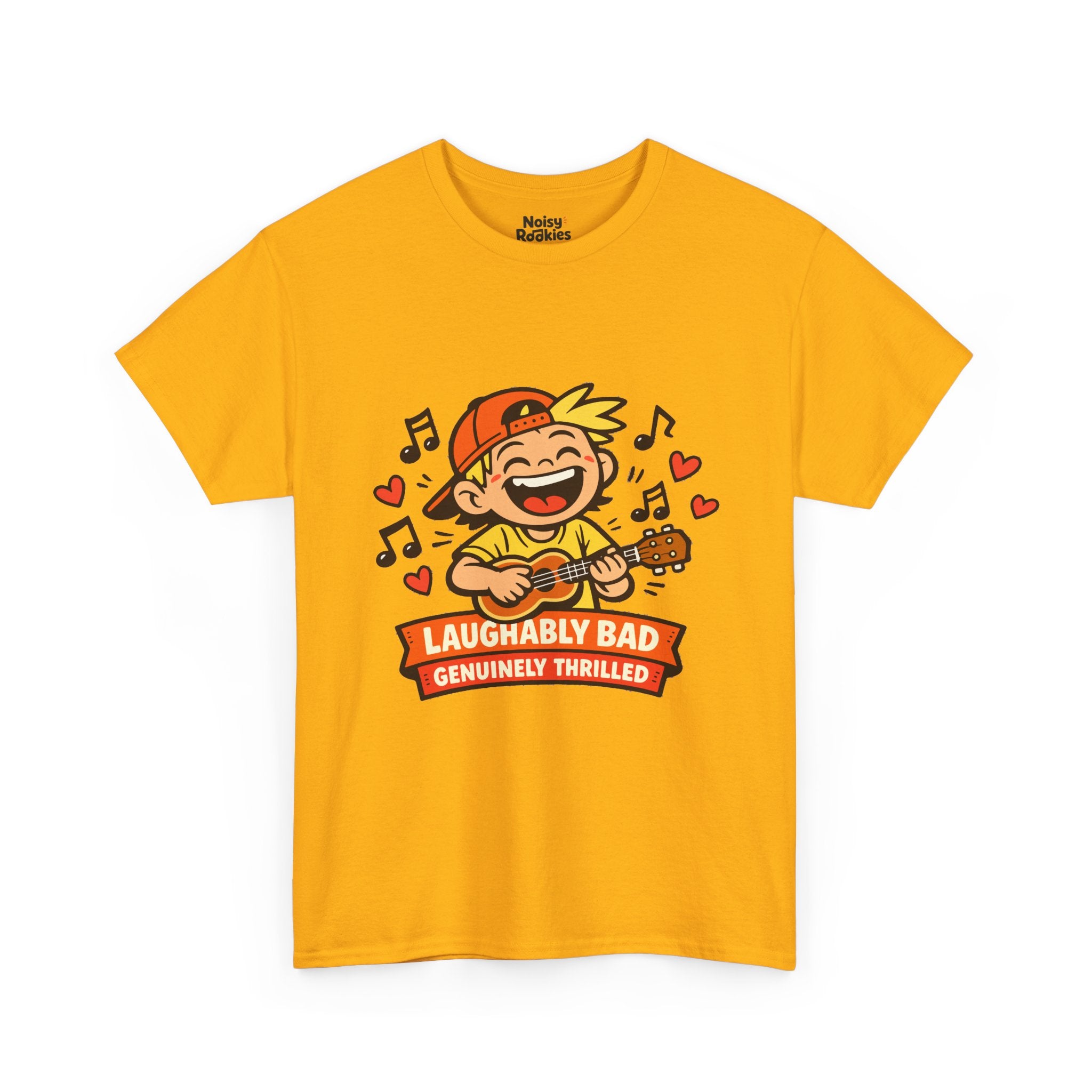 Light-shirt design of a beaming cartoon kid in a backward cap strumming a ukulele, surrounded by music notes and hearts, over a banner reading Laughably Bad Genuinely Thrilled.