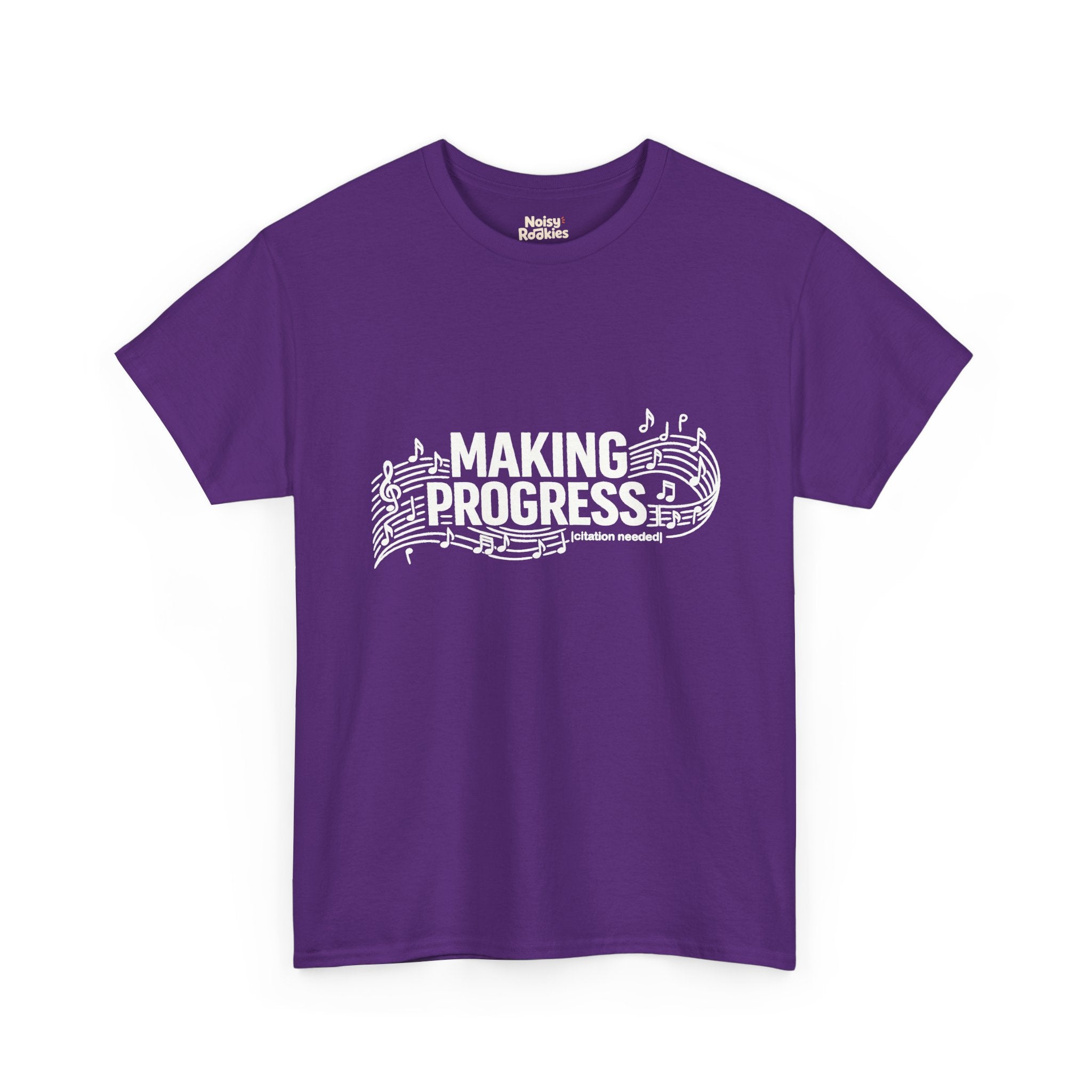 White t-shirt design reading MAKING PROGRESS with a small "citation needed" tag, woven through a flowing musical staff with a treble clef and scattered notes.