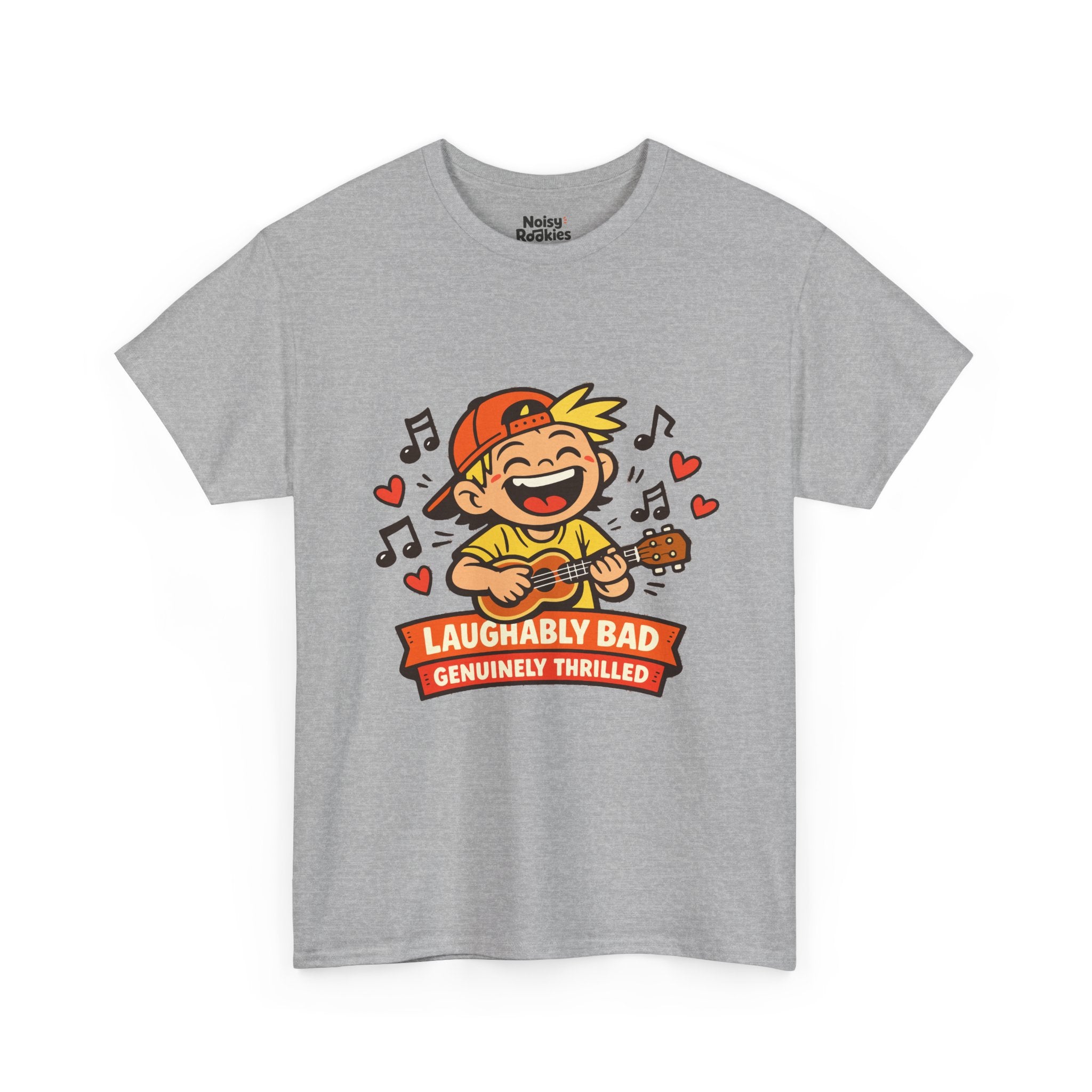 Light-shirt design of a beaming cartoon kid in a backward cap strumming a ukulele, surrounded by music notes and hearts, over a banner reading Laughably Bad Genuinely Thrilled.