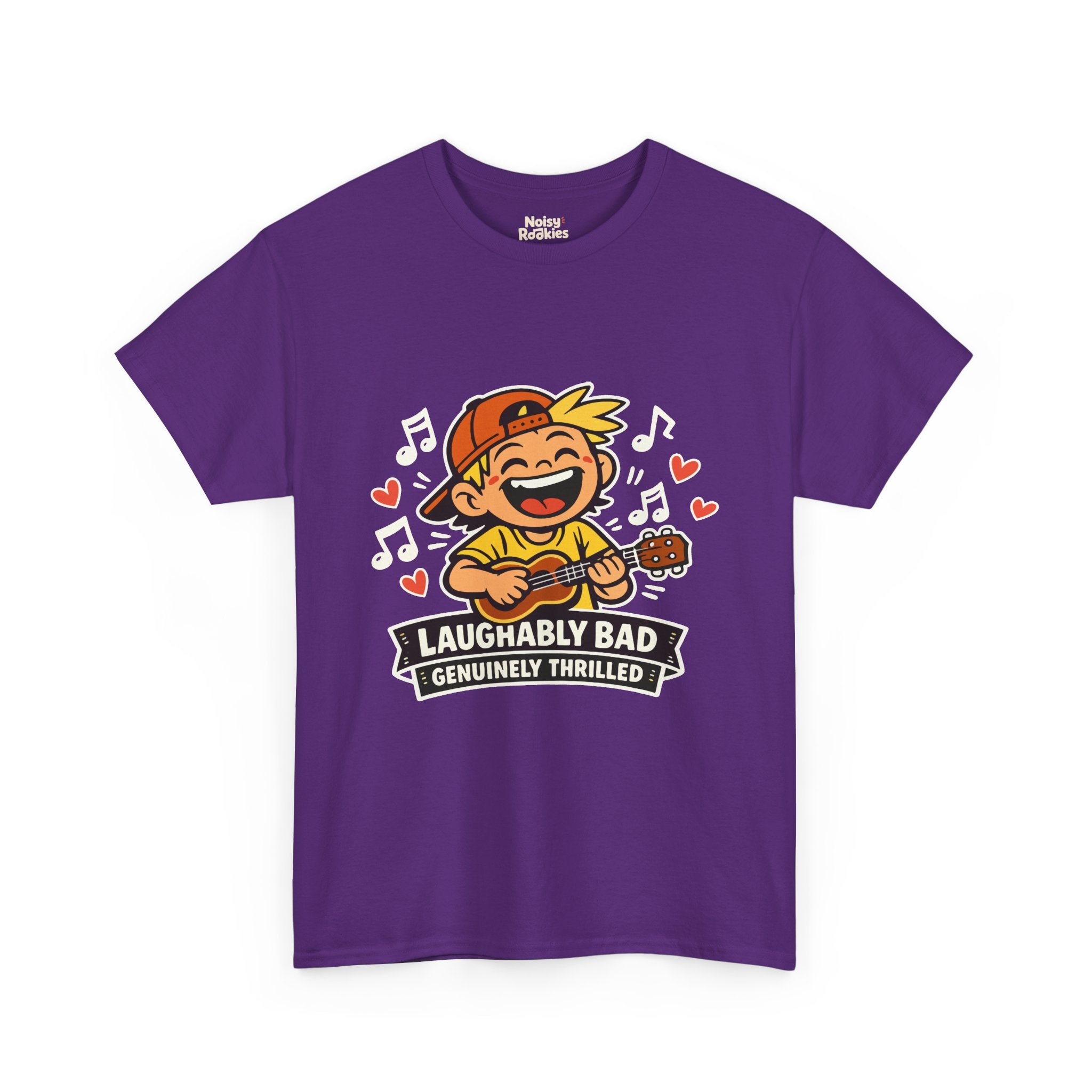 Dark-shirt design of a beaming cartoon kid in a backward cap strumming a ukulele, surrounded by music notes and hearts, over a banner reading Laughably Bad Genuinely Thrilled.