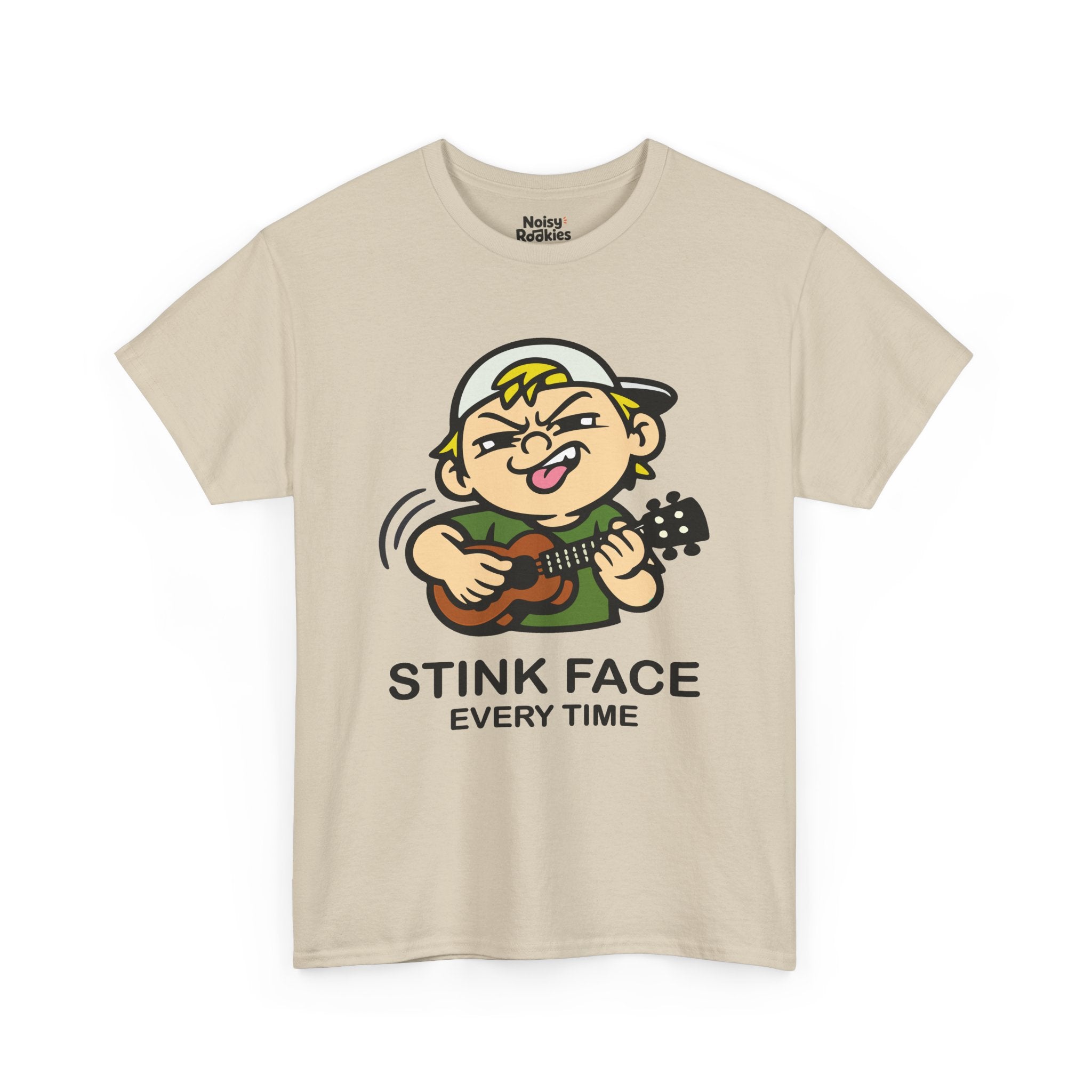 A cartoon kid in a backwards cap and a green tee strumming a ukulele, face screwed up in total concentration with the nose wrinkled, one eye squinted shut, teeth bared and tongue out, motion arcs trailing the strumming hand. Black caption beneath reads STINK FACE on the first line and EVERY TIME on the second.