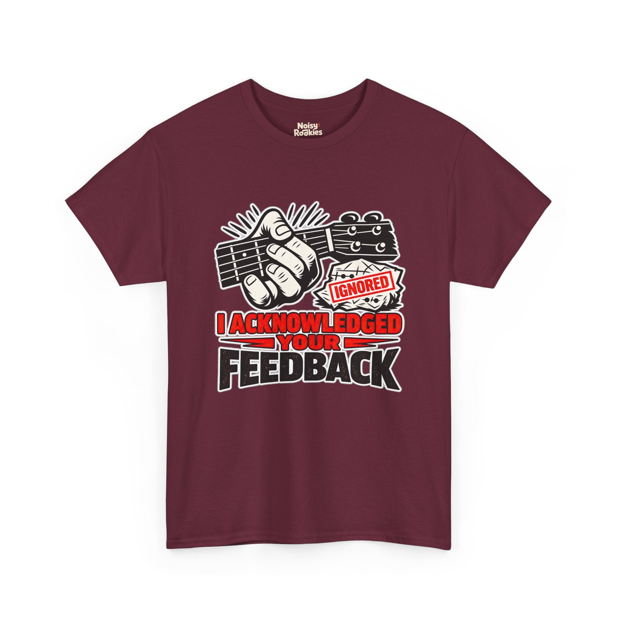T-shirt design of a hand gripping a four string fretted neck in a deliberately wrong fist grip, beside a crumpled chord diagram stamped IGNORED in red, with the bold caption I ACKNOWLEDGED YOUR FEEDBACK below in red and black outlined letters.