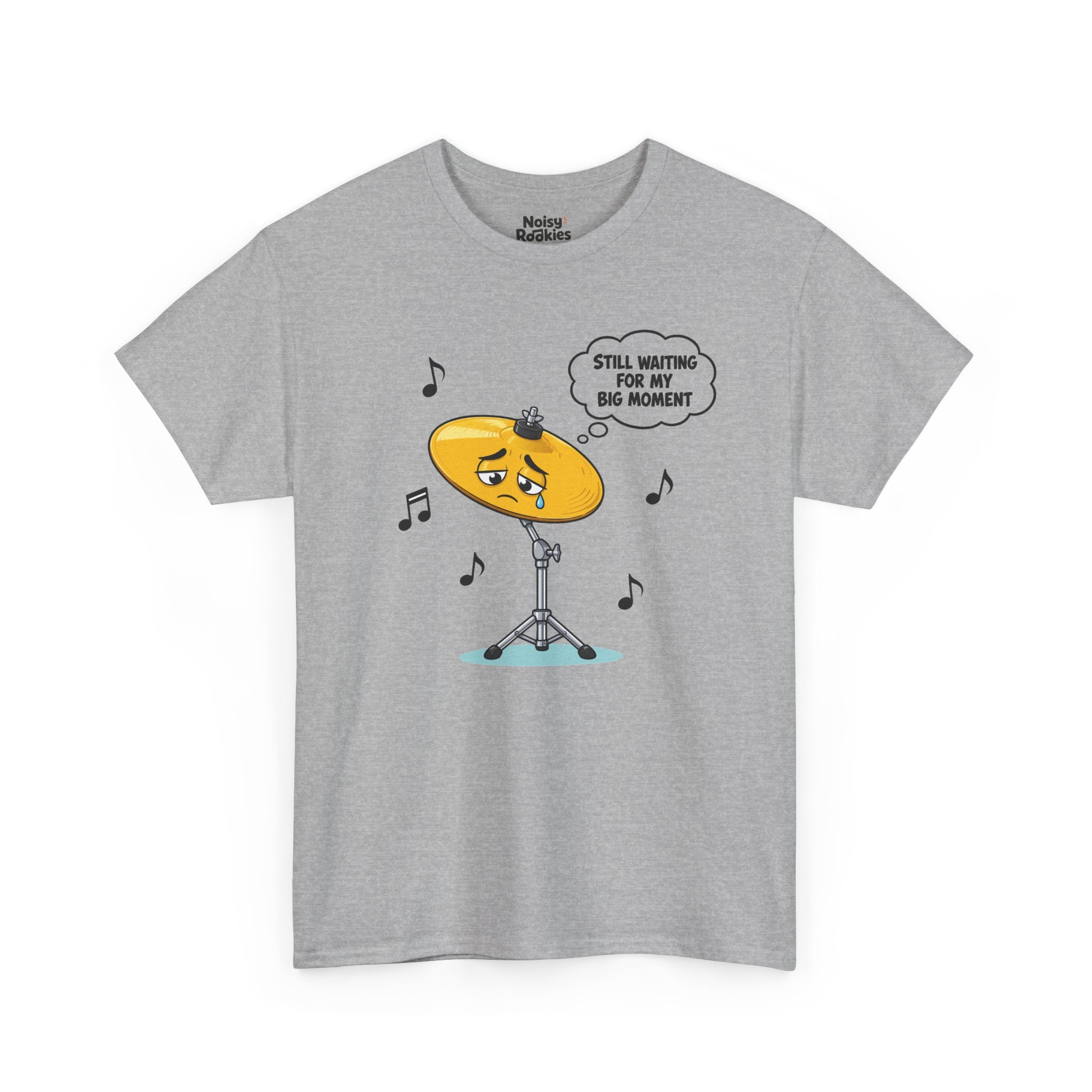 Light-shirt design of a sad cartoon cymbal on a stand with a single tear, a thought bubble reading Still Waiting for My Big Moment, surrounded by music notes.