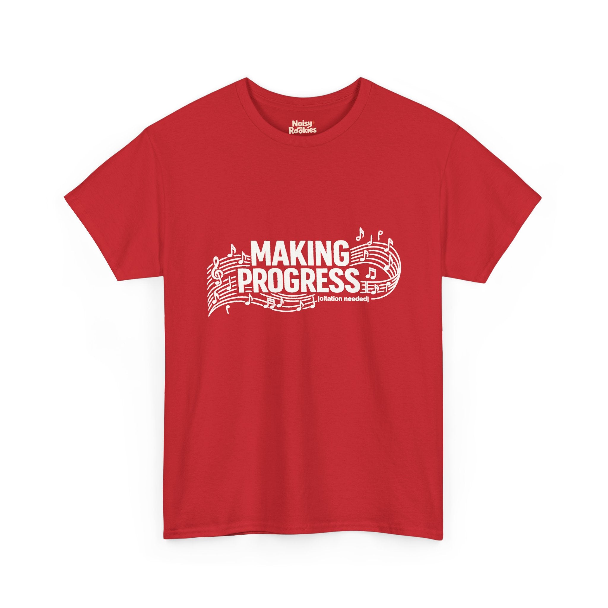 White t-shirt design reading MAKING PROGRESS with a small "citation needed" tag, woven through a flowing musical staff with a treble clef and scattered notes.