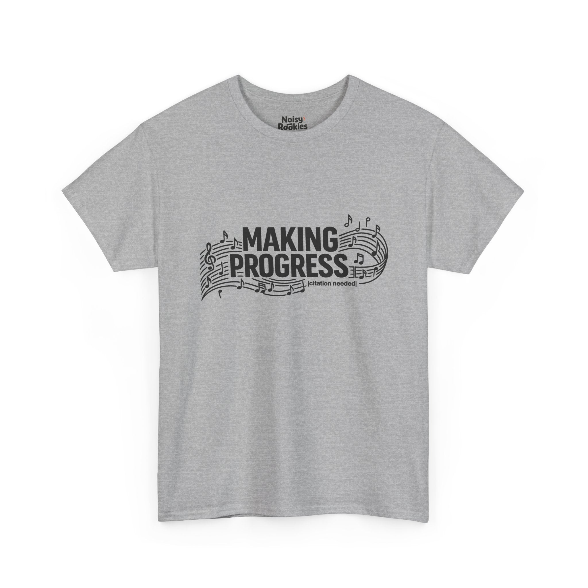 Dark-ink t-shirt design reading MAKING PROGRESS with a small "citation needed" tag, woven through a flowing musical staff with a treble clef and scattered notes.